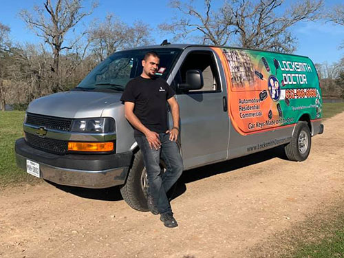 Locksmith Doctor owner, Wael Abbas in front of one of his locksmith vans.
